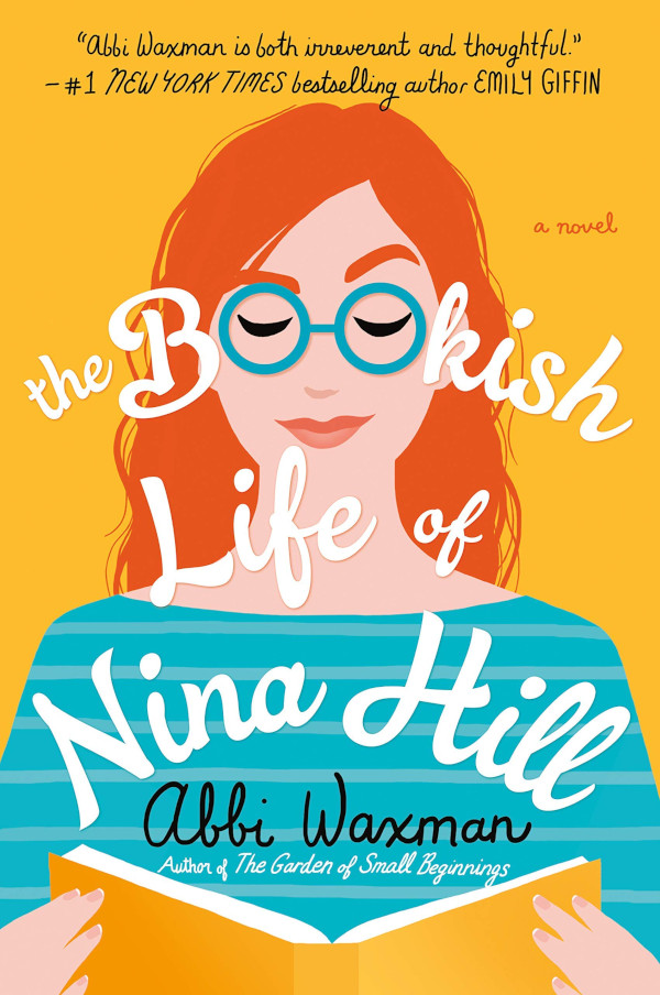 Book cover for the Bookish Life of Nina Hill showing a woman with glasses reading a book.