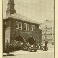 Postcard of the new firehouse located on Harrison Avenue