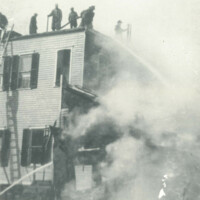 Firefighters fighting the 1921 fire on Fremont Street that destroyed the fire house